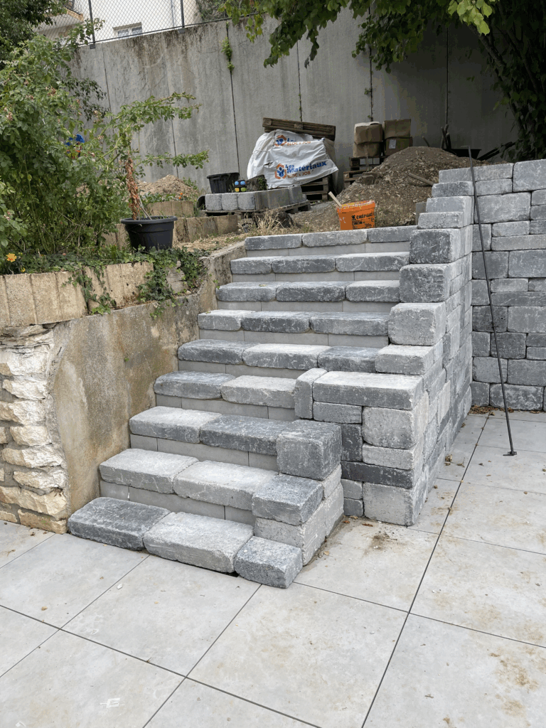 Aménagement extérieur premium Liverdun terrasse 100m² piscine bois murs soutènement MAN OF STYLE bimuraux